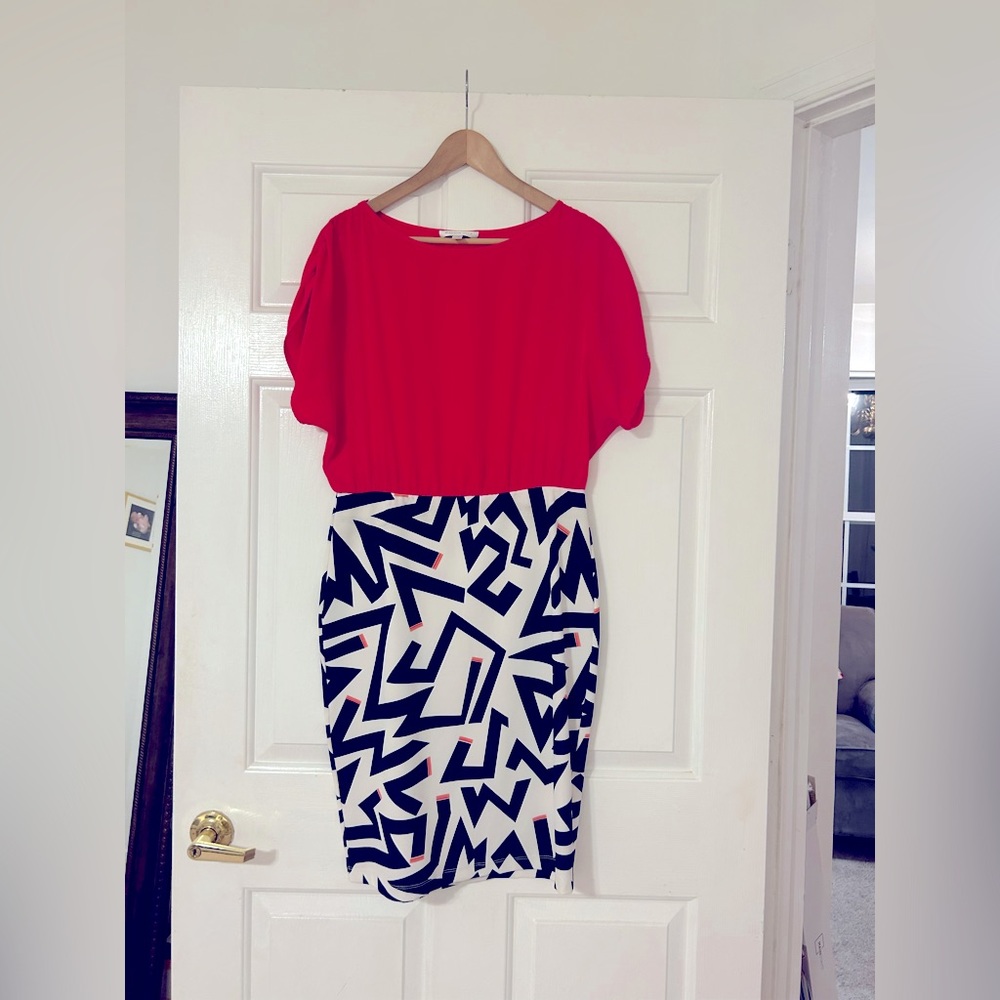 Like new dress. Size 40/L skirt is stretchy, blouse looks beautiful